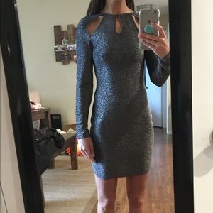 Black long sleeve body con dress.